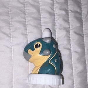 Jurassic World Camp Cretaceous Bumpy Ankylosaurus Good2Grow bottle topper.